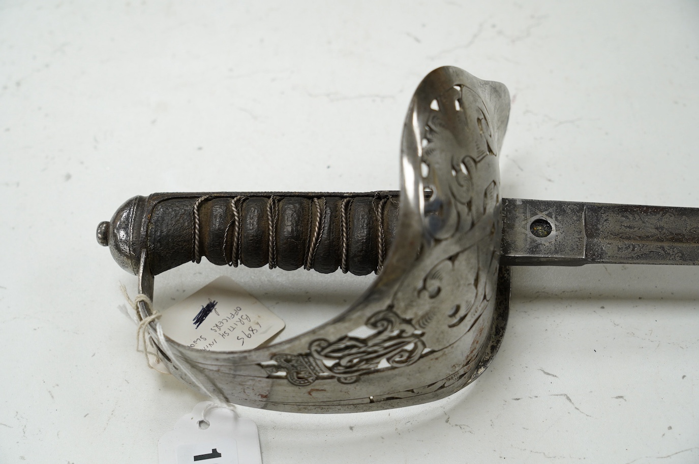 A Victorian 1897 pattern Royal Engineers officer’s sword by Wilkinson, No. 27191, etched with regimental devices, owner’s crest and initials, regulation steel guard, blade 83cm. Condition - poor